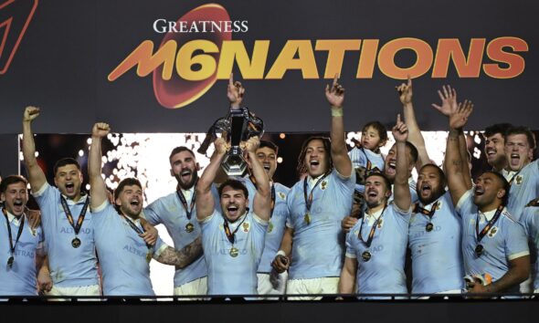 France players lift the Six Nations trophy after beating England in Paris Photo: Shaun Botterill Getty Images
