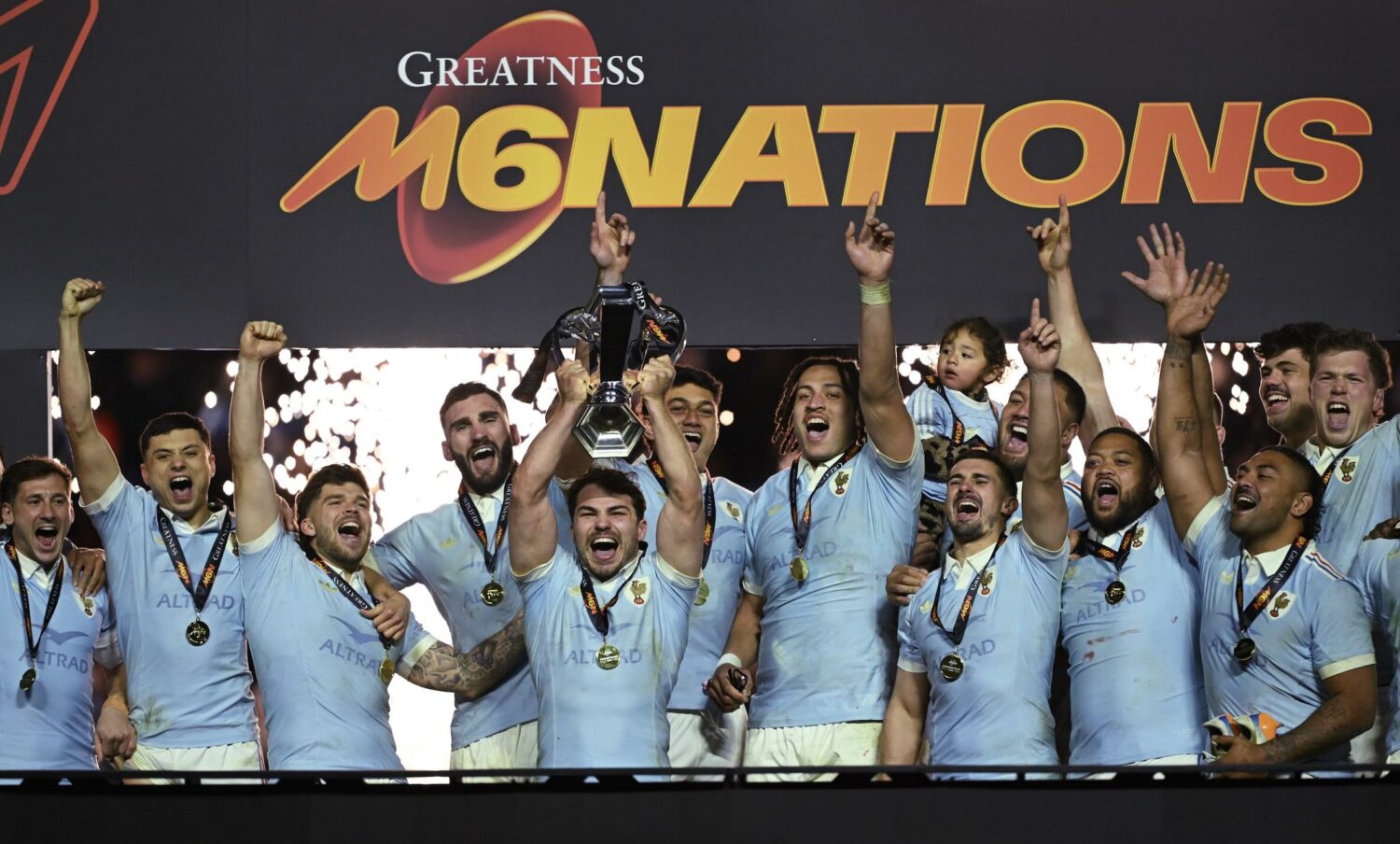 France players lift the Six Nations trophy after beating England in Paris Photo: Shaun Botterill Getty Images