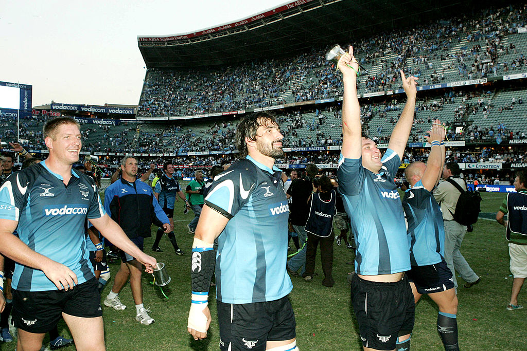 Bakkies Botha, Victor Matfield and Pedrie Wannenburg of the Bulls celebrate after the Super 14 Final match between the Sharks and the Bulls held at the Absa Stadium on May 19, 2007 in Durban, South Africa. (Photo by Duif du Toit/Gallo Images/Getty Images)