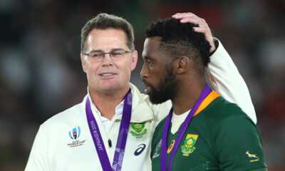 : Rassie Erasmus, Head Coach of South Africa talks to Siya Kolisi of South Africa after victory in the Rugby World Cup 2019 Final between England and South Africa at International Stadium Yokohama on November 02, 2019 in Yokohama, Kanagawa, Japan. (Photo by Cameron Spencer/Getty Images)