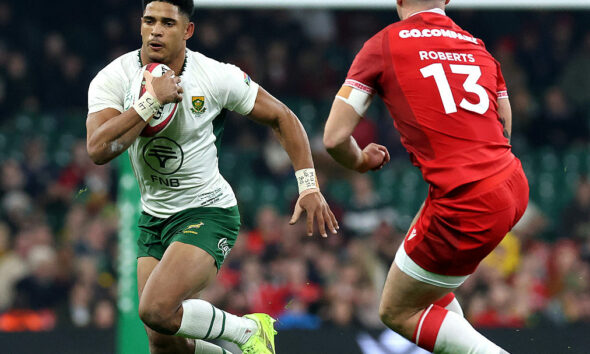Sacha Feinberg-Mngomezulu of South Africa takes on Joe Roberts during the Quilter Nations Series 2025 rugby international match between Wales and South Africa at Principality Stadium on November 29, 2025 in Cardiff, Wales. (Photo by David Rogers/Getty Images)