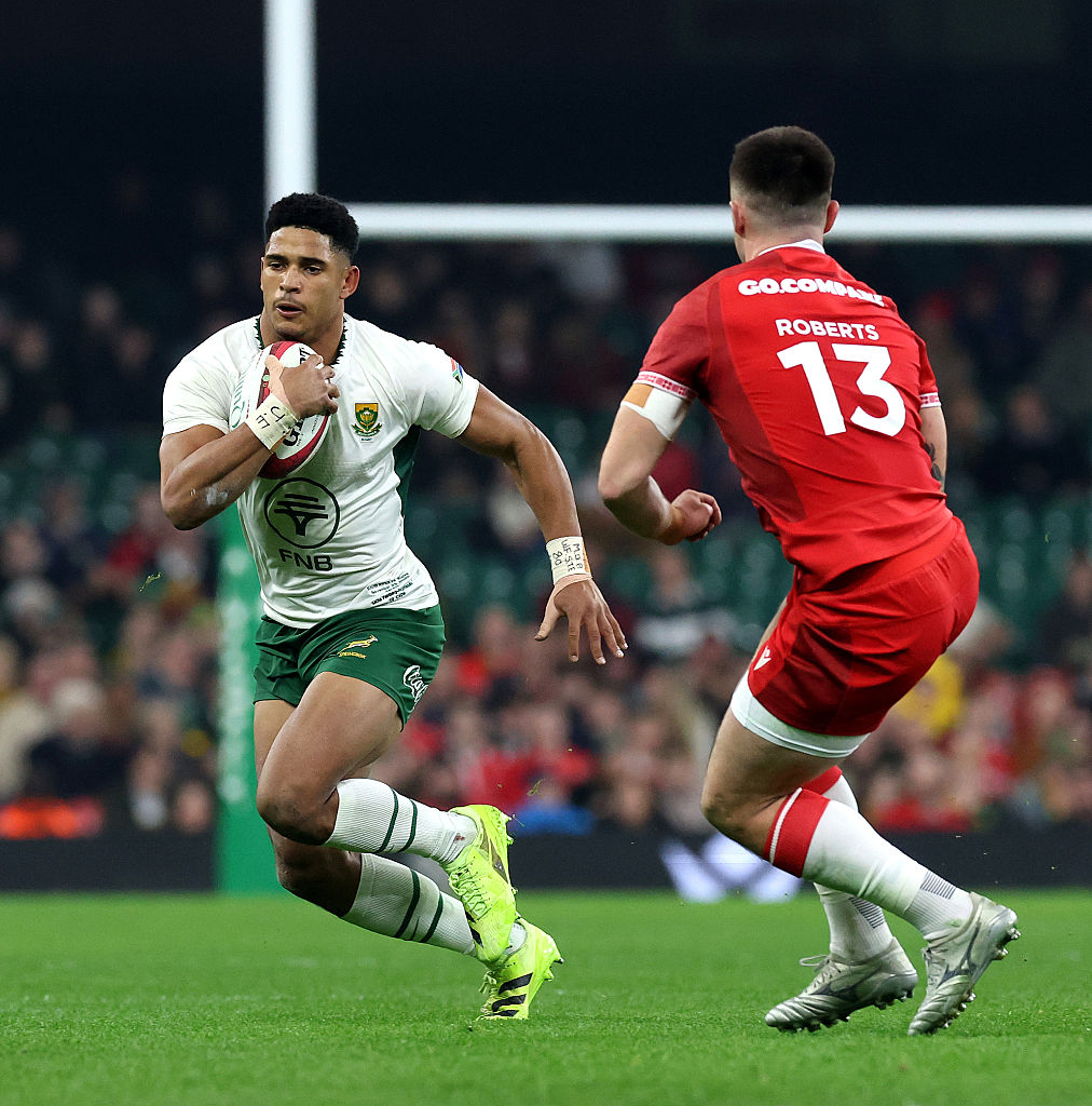 Sacha Feinberg-Mngomezulu of South Africa takes on Joe Roberts during the Quilter Nations Series 2025 rugby international match between Wales and South Africa at Principality Stadium on November 29, 2025 in Cardiff, Wales. (Photo by David Rogers/Getty Images)