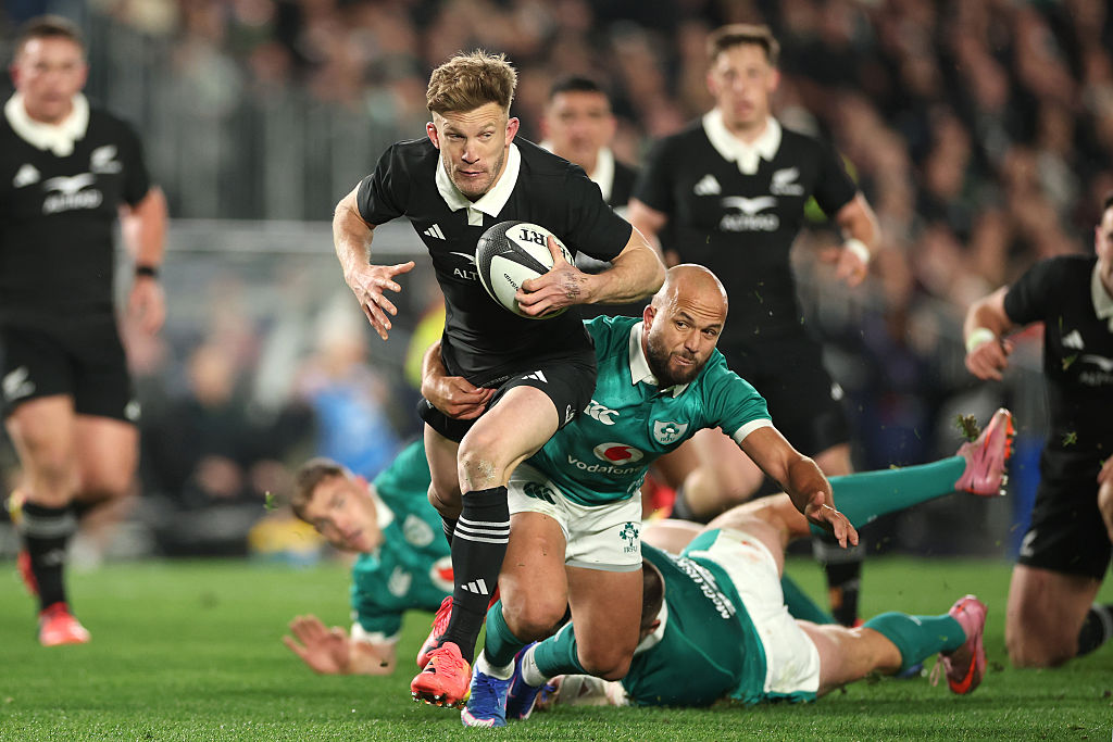 Damian McKenzie of the New Zealand All Blacks makes a break during the Nations Championship match between New Zealand All Blacks and Ireland at Eden Park on July 18, 2026 in Auckland, New Zealand. (Photo by Phil Walter/Getty Images)
