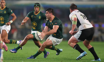 Paul de Villiers of South Africa runs with the ball while under pressure from Ryan Elias of Wales during the 2026 Nations Championship match between South Africa and Wales at Kings Park Stadium on July 18, 2026 in Durban, South Africa. (Photo by David Rogers/Getty Images)