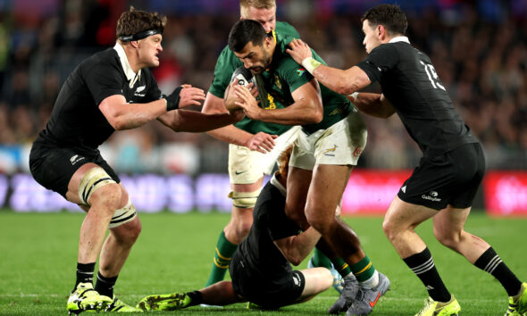 Damian de Allende of South Africa is tackled during The Rugby Championship match between the New Zealand All Blacks and South Africa Springboks at Eden Park on September 06, 2025 in Auckland, New Zealand. (Photo by Phil Walter/Getty Images)