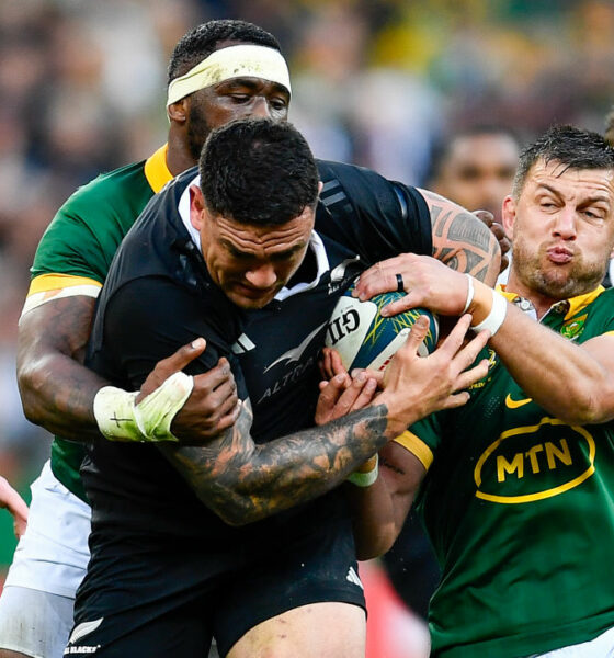 Codie Taylor of the All Blacks tackled by Handre Pollard and Siya Kolisi (captain) of the Springboks during the Castle Lager Rugby Championship match between South Africa and New Zealand at DHL Stadium on September 07, 2024 in Cape Town, South Africa. (Photo by Ashley Vlotman/Gallo Images/Getty Images)