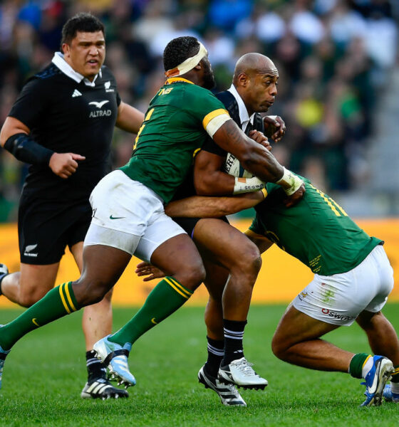 Mark Tele'a of the All Blacks tackled by Damian de Allende and Siya Kolisi (captain) of the Springboks during the Castle Lager Rugby Championship match between South Africa and New Zealand at DHL Stadium on September 07, 2024 in Cape Town, South Africa. (Photo by Ashley Vlotman/Gallo Images/Getty Images)