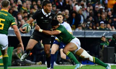 Rieko Ioane of New Zealand tackled by Sacha Feinberg-Mngomezulu of South Africa during the Castle Lager Rugby Championship match between South Africa and New Zealand at DHL Stadium on September 07, 2024 in Cape Town, South Africa. (Photo by Grant Pitcher/Gallo Images)